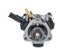 Carica l'immagine nel visualizzatore di Gallery, High pressure fuel pump, black and silver mounting face with circular center inlet
