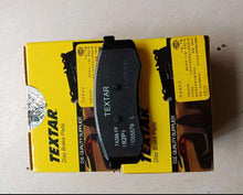 Carica l'immagine nel visualizzatore di Gallery, Brake pad set in yellow box, two black TEX TAR disc brake pads with labels