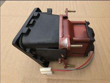 Carregar imagem no visualizador da galeria, Front fog lamp light assembly, angled view with black housing and red metal bracket