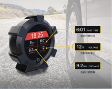 Załaduj obraz do przeglądarki galerii, Round black dashboard gauge showing speed, voltage, and distance readouts