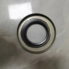 Carica l'immagine nel visualizzatore di Gallery, Oil seal with metal housing and black rubber sealing lip, visible outer edge