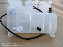 Charger l'image dans la galerie, White expansion tank with side ports and long black hose, wall-mount bracket
