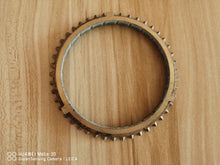 Carica l'immagine nel visualizzatore di Gallery, Round metal ring gear with evenly spaced outer teeth, synchronizer ring