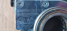 Cargar imagen en el visor de la Galería, Blue metal adjustment arm with embossed markings and circular joint opening