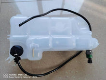 Charger l'image dans la galerie, White expansion tank reservoir with black hose loop and green-tipped pressure fitting