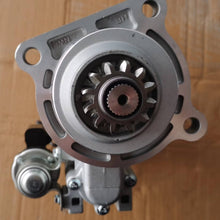 Charger l'image dans la galerie, Starter motor assembly with circular gear drive and mounting flange, metallic gray