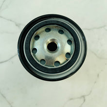 Carregar imagem no visualizador da galeria, Fuel filter base with metal ring, central inlet, and circular bolt holes