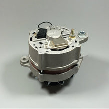 Cargar imagen en el visor de la Galería, Silver alternator top view with red stripe, wiring terminals, and mounting bolts