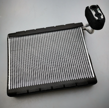 Load image into Gallery viewer, Car HVAC evaporator core with black frame and silver cooling fins
