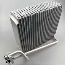 Load image into Gallery viewer, Car HVAC evaporator core with dense silver cooling fins and side mounting bar
