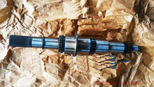 Load image into Gallery viewer, Transmission second shaft with multiple splines and blue metal sleeve sections
