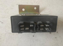 Load image into Gallery viewer, IVEC O control box with rear plug openings and metal mounting bracket
