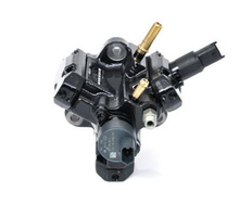 Load image into Gallery viewer, High pressure fuel pump assembly, black housing with brass lines and electrical connector
