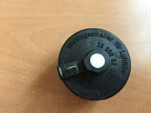 Load image into Gallery viewer, Air filter blockage alarm switch, round black cover with central hole and markings
